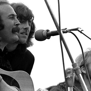 BIG SUR - SEPTEMBER 15: Crosby, Stills and Nash and Young (L-R David Crosby, Graham Nash and Stephen Stills) perform onstage at the Big Sur Folk Festival held at the Esalen Institue on September, 15 1969 in Big Sur, California. (Photo by Robert Altman/Michael Ochs Archives/Getty Images)