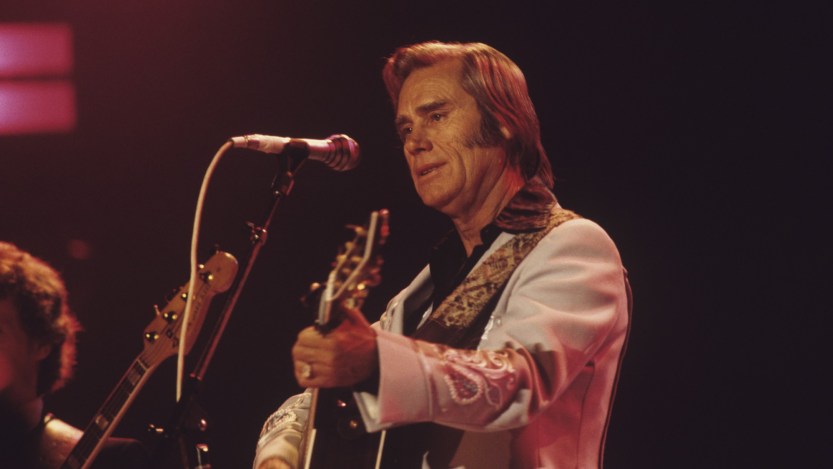 LONDON, UNITED KINGDOM - APRIL 01: George Jones performs on stage at the Country Music Festival held at Wembley Arena, London in April 1981. (Photo by David Redfern/Redferns)