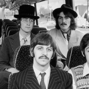 The Beatles riding the bus