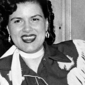 Patsy Cline in cowgirl fringe