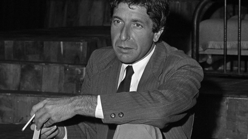 Leonard Cohen sitting down