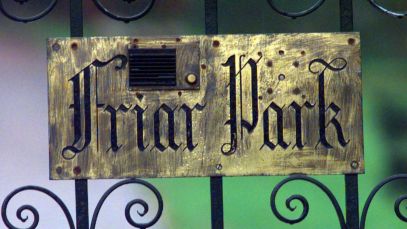 Sign on gate at George Harrison's home, built by Sir Frank Crisp
