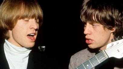 Brian Jones and Mick Jagger singing