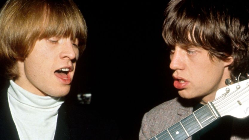 Brian Jones and Mick Jagger singing