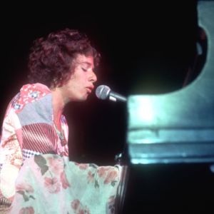 Carole King on piano