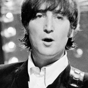 John Lennon performing