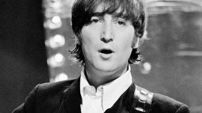John Lennon performing