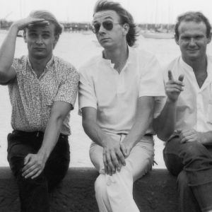 Men At Work sitting together