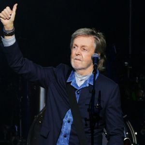 Paul McCartney performing at O2 arena