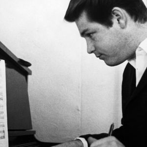 Brian Wilson sitting at piano