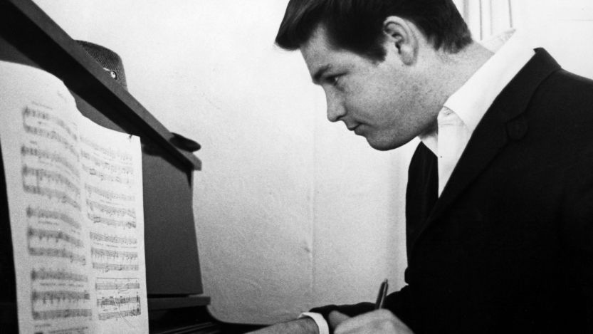 Brian Wilson sitting at piano
