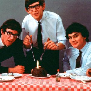 Late 1960s band The Zombies sitting at table