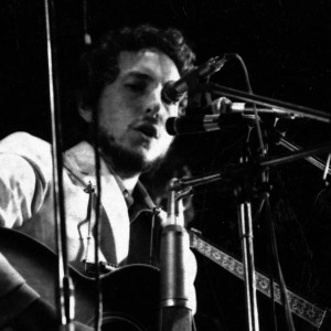 Bob Dylan performing at The Isle of Wight Festival, 30th August 1969. (Photo by Daily Mirror/Mirrorpix/Getty Images)