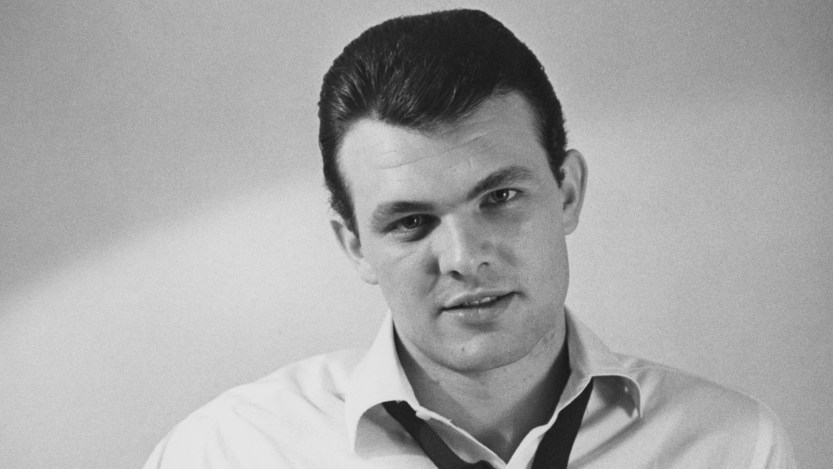 Pop singer and songwriter Tommy Roe pictured wearing a white shirt and black tie which is loose around his neck, USA, circa 1965. (Photo by Archive Photos/Getty Images)