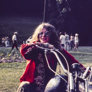 American singer-songwriter Janis Joplin (1943 - 1970) astride a chopper, Columbus, Ohio, June 1970. (Photo by John Byrne Cooke Estate/Getty Images)