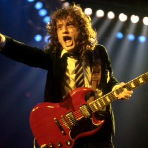 DETROIT - NOVEMBER 17: Angus Young, the Australian musician, best known as the co-founder, lead guitarist, and songwriter of the Australian hard rock band AC/DC, onstage at the Joe Louis Arena during the band's "Flick of the Switch/Monsters of Rock" tour, on November 17, 1983, in Detroit, Michigan. (Photo by Ross Marino/Getty Images)
