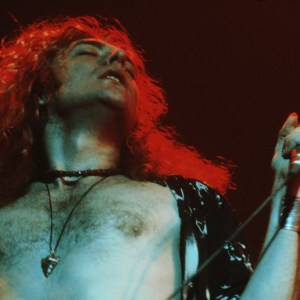 Singer Robert Plant, of British rock band Led Zeppelin, performing on stage, 1971. (Photo by Michael Putland/Getty Images)