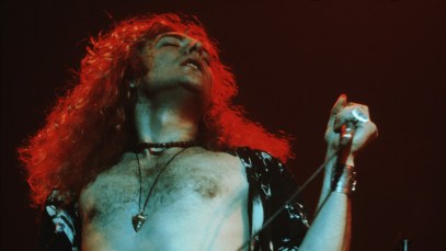 Singer Robert Plant, of British rock band Led Zeppelin, performing on stage, 1971. (Photo by Michael Putland/Getty Images)