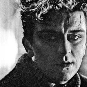 Welsh pop singer Steve Strange (1959 - 2015), of British new romantic group, Visage, during the filming of a video for the group's single, 'Night Train', at the Tenterden Town railway station of the Kent and East Sussex Railway in Tenterden, East Sussex, on the evening of 14th January 1982. (Photo by Brian Cooke/Redferns)