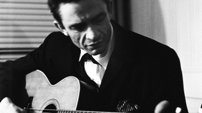 NEW YORK - JULY 1965: Country singer Johnny Cash warms up backstage at the New York Folk Festival in July of 1965 at Carnegie Hall in New York, New York. (Photo by Don Paulsen/Michael Ochs Archives/Getty Images)