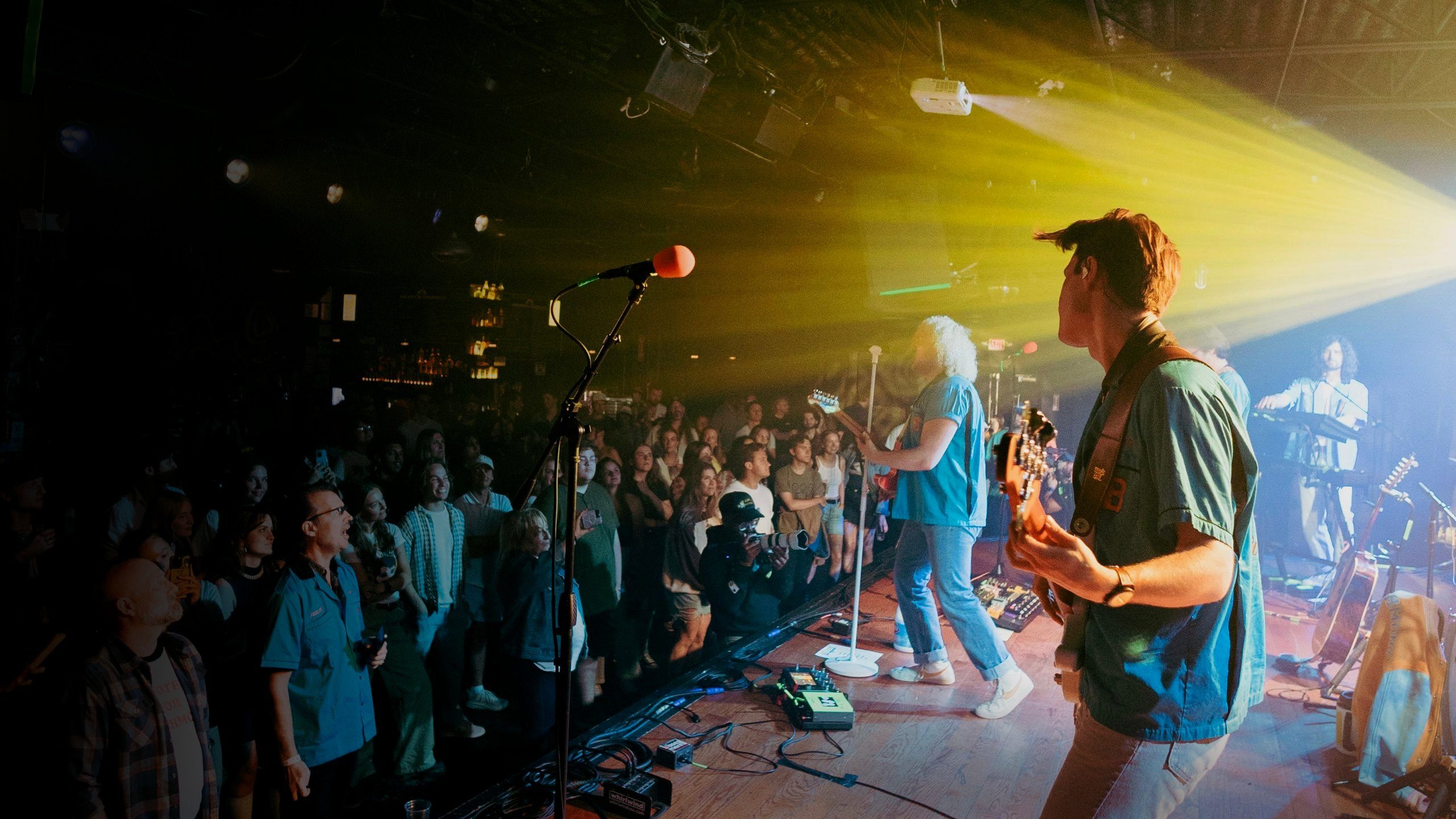 Live band performing to a packed crowd