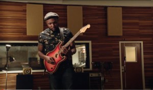Watch Guitarist Naia Izumi Create Loops, Harmonics and Percussive Rhythms On The Fender Acoustasonic Stratocaster