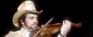 The Meaning Behind “The Fightin’ Side of Me” by Merle Haggard and Why the Hippies “Pissed” Him Off