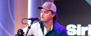 Watch Zach Top Channel His Inner Jimmy Buffett with an Unreleased Beach Vibe Breakup Song