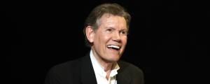 Watch Randy Travis Share a Hilariously Wholesome Moment with a Southwest Airlines Flight Attendant