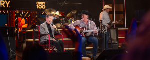 Watch Randy Travis, Clay Walker Announce Biopic About Travis’ Life from Opry Stage