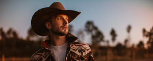 World Premiere: Comedian Matt Mathews Chasing Lifelong Country Music Dream With Debut Songs