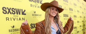 Watch Lainey Wilson Light Up the Stage With “Heart Like a Truck,” “Wildflowers and Wild Horses,” & More at the 2026 iHeartRadio Music Awards