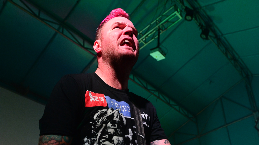 Founding Member of Pioneering 2000s Rock Band Makes Emotional Return to the Stage in a Wheelchair Amid Cancer Battle