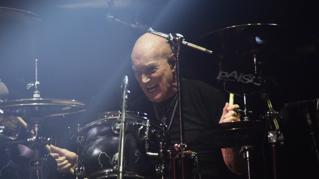 “Bye For Now”: Former AC/DC Member Chris Slade Announces Retirement From Drumming
