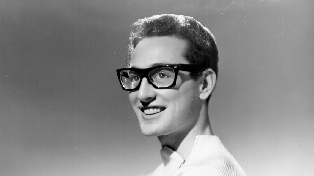 On This Day in 1957, Buddy Holly Topped the Charts With a John Wayne-Inspired Hit His Label Refused to Release On This Day in 1957, Buddy Holly Topped the Charts With a John Wayne-Inspired Hit His Label Refused to Release